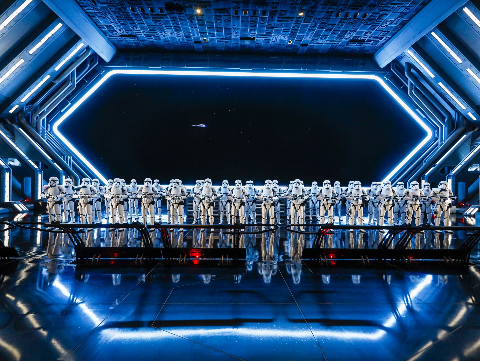 Stormtroopers stand at attention as part of Disney World's Star Wars: Rise of the Resistance attraction.