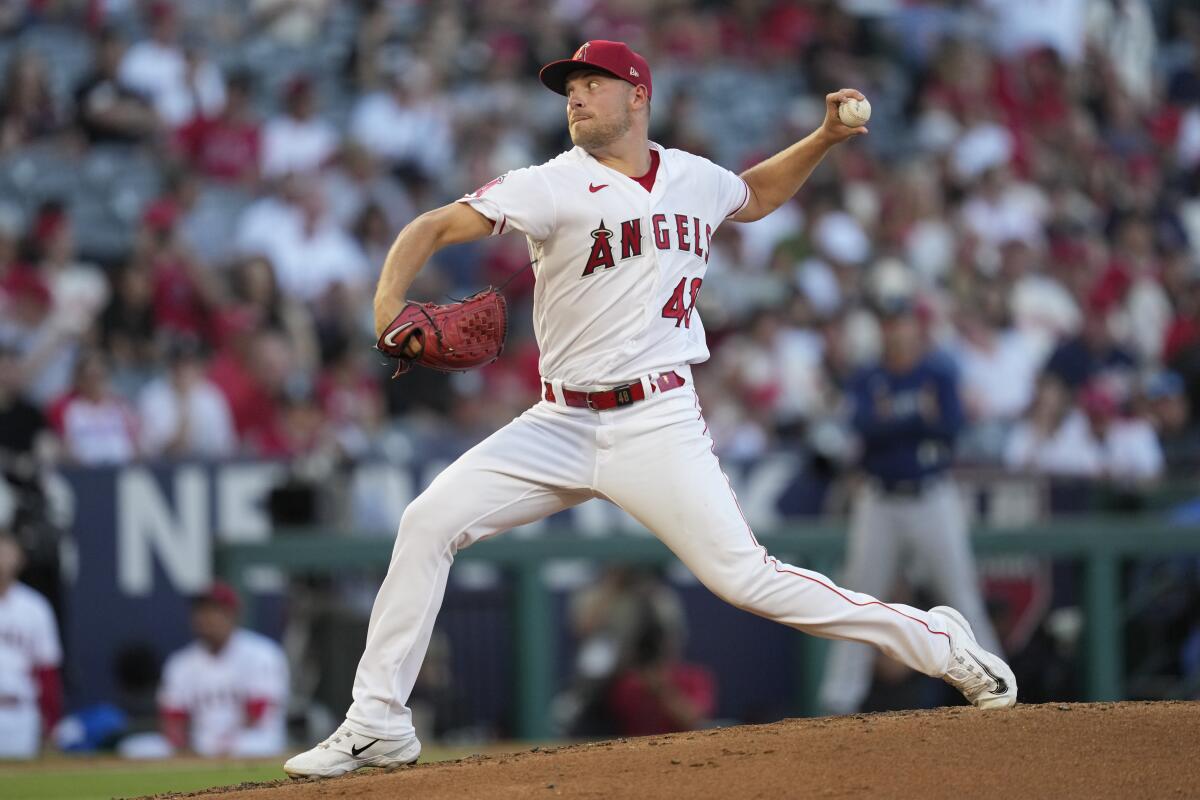 Los Angeles Angels starting pitcher Reid Detmers (48) throws during the first inning of a baseball game.