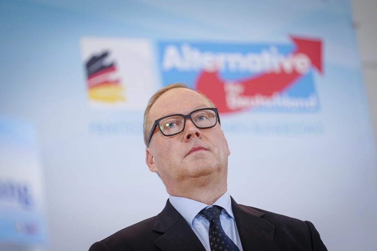 Max Otte, chairman of the Values Union and CDU party member, takes part in an Alternative for Germany party (AfD) press conference at the beginning of the AfD parliamentary group meeting in the Reichstag building in Berlin, Germany, Tuesday, Jan. 25, 2022. The far-right Alternative for Germany party is nominating the member of former Chancellor Angela Merkel’s Christian Democratic Union as its long-shot candidate to become the country’s next president, prompting calls within his own party for him to leave or be expelled. (Kay Nietfeld/dpa via AP)