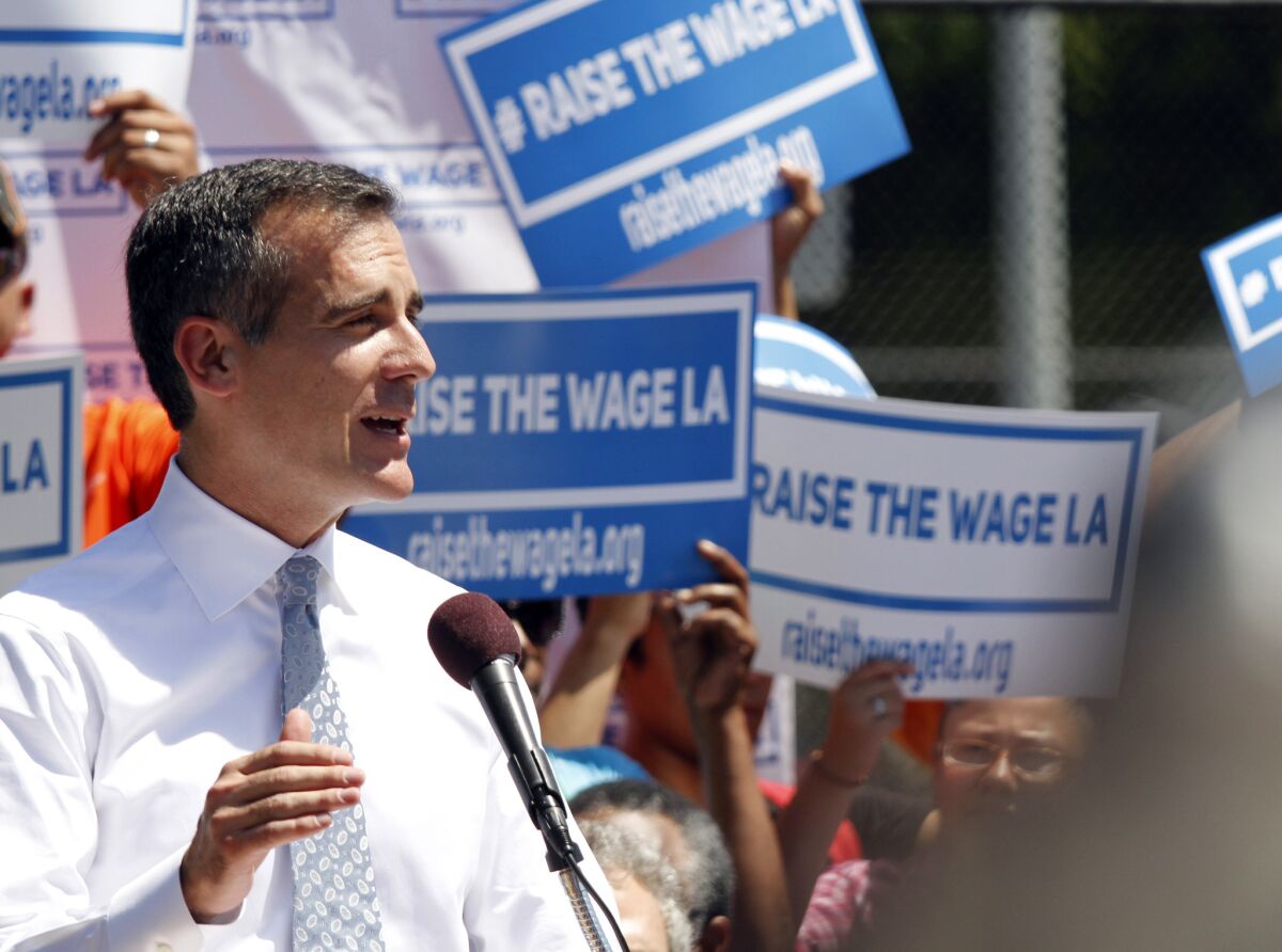 Mayor Eric Garcetti announces his plan to raise the minimum wage in Los Angeles in September.