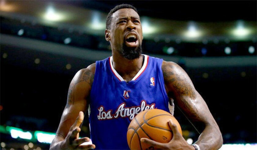 DeAndre Jordan reacts after being called for a foul during the Clippers' 96-88 win Wednesday over the Boston Celtics at the TD Garden. Jordan had just five points and six rebounds in 32 minutes for the Clippers.