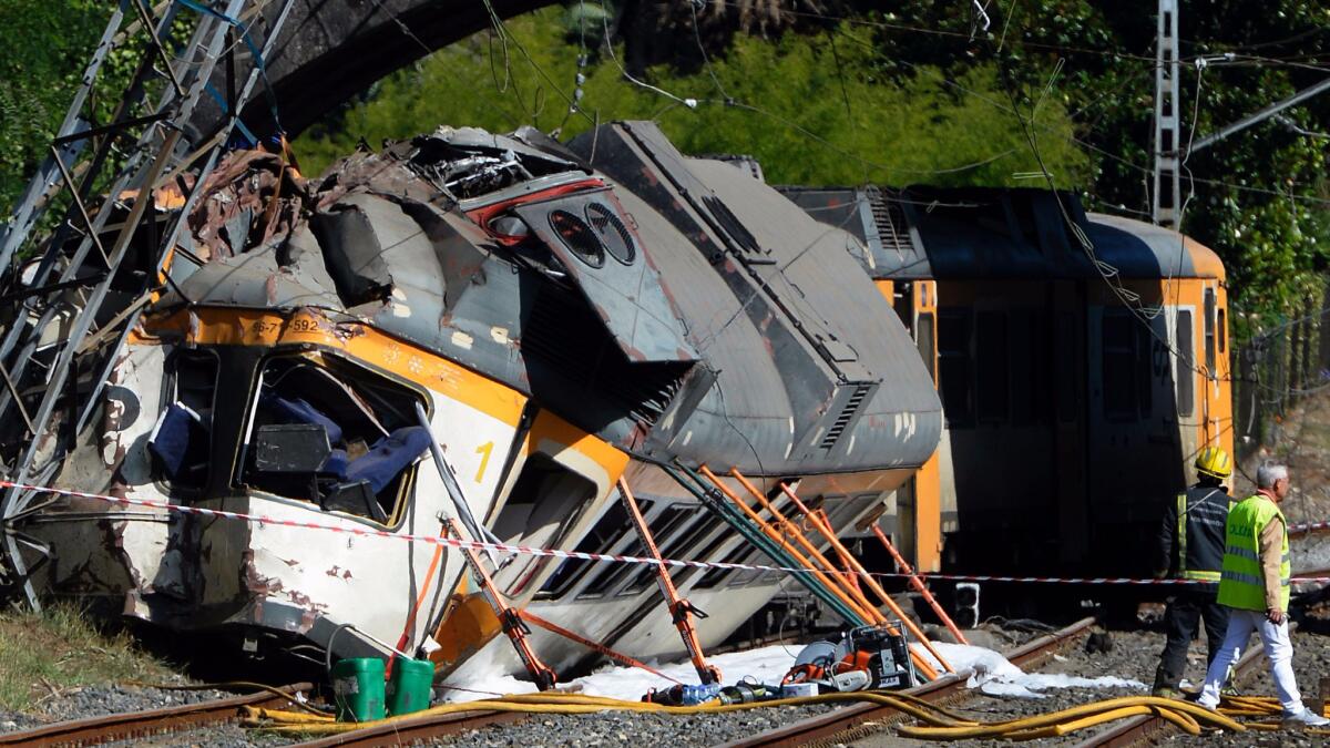 A three-car passenger train derailed in Porrino, Spain, about 280 miles northwest of Madrid, on Sept. 9.