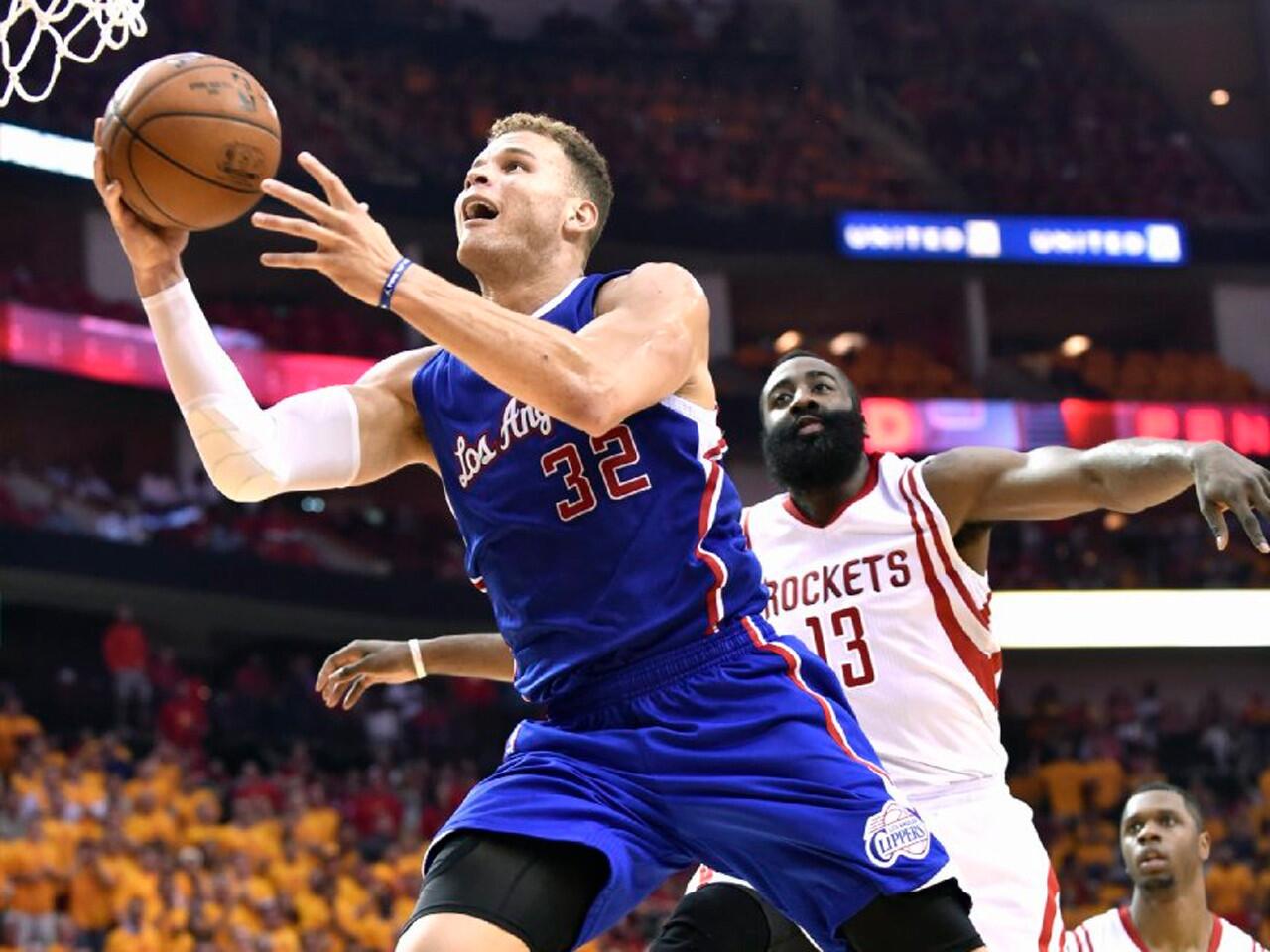 Blake Griffin beats Houston guard James Harden to the basket during the second quarter of Game 5 of the second round playoff series between the Clippers and the Rockets.