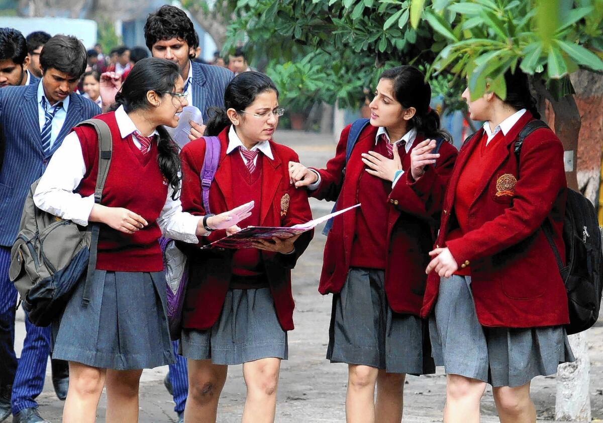 Students after a test in Gurgaon, India, last month. Schools have used closed-circuit cameras and armed guards to discourage cheating.