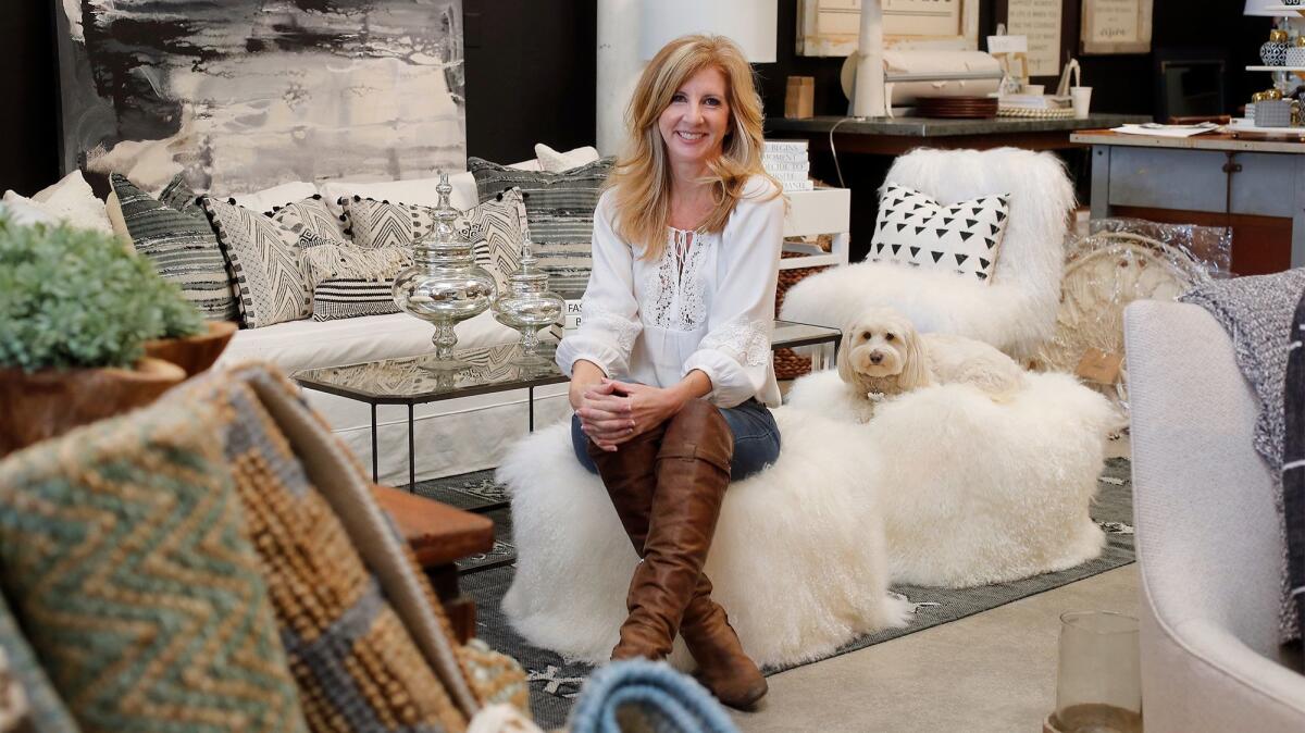 Owner Tiffany Hunter at her design shop, the Wonder Room, in Westside Costa Mesa. Hunter searches for one-of-a-kind pieces best suited to the architecture and style of a home.