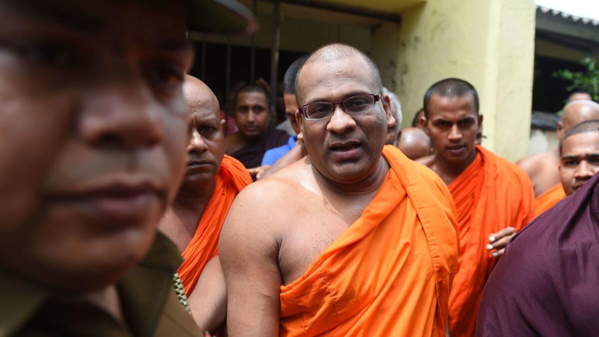 Buddhist monk Galagodatte Gnanasara arrives at a court in Colombo, Sri Lanka, in June 2017.