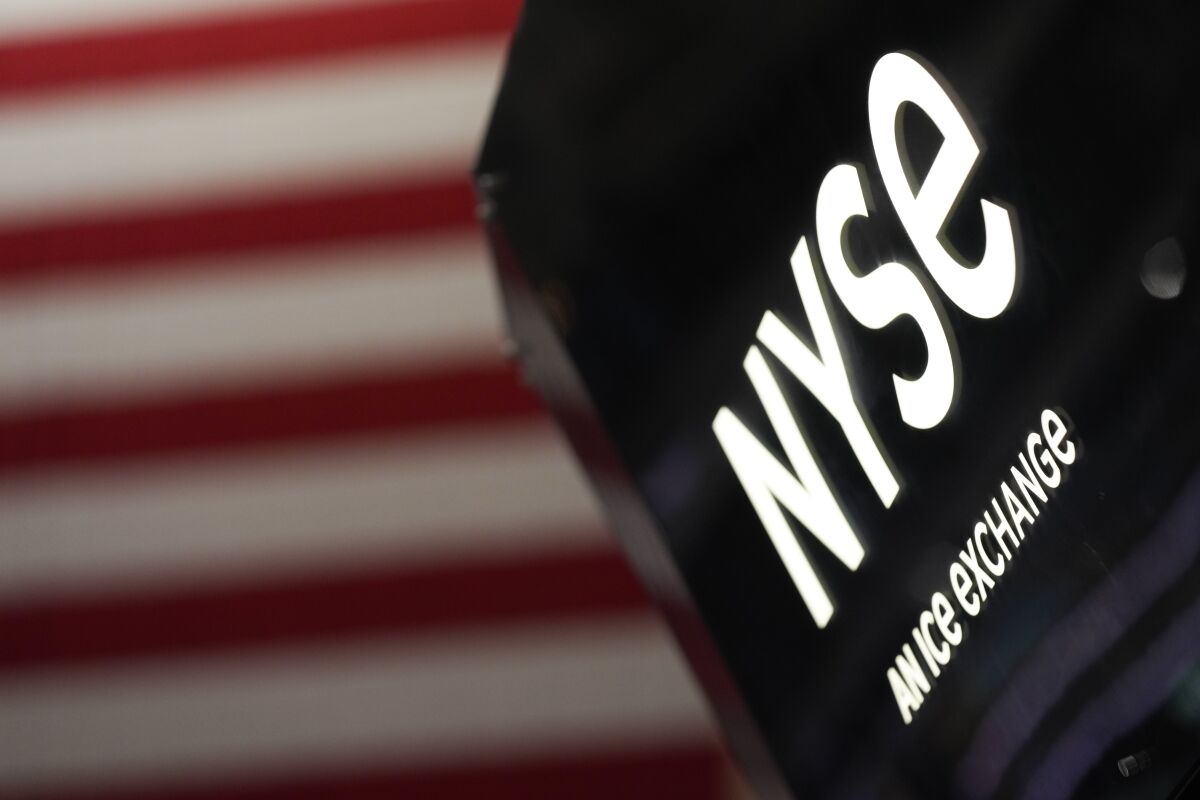 An NYSE sign is seen on the floor at the New York Stock Exchange in New York.