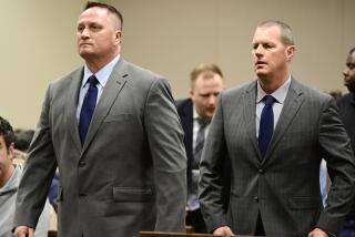 Paramedics Jeremy Cooper, left, and Peter Cichuniec, right, attend an arraignment at the Adams County Justice Center in Brighton, Colo., on Jan. 20, 2023. The third and final trial over the 2019 death of Elijah McClain after he was stopped by police in suburban Denver involves homicide and manslaughter charges against two paramedics, a prosecution experts say enters largely uncharted legal territory by levying criminal charges against medical first responders. (Andy Cross/The Denver Post via AP, file)