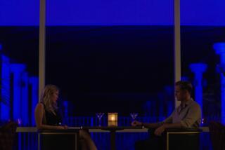 Mia Goth, left, and Alexander Skarsgård in 'Infinity Pool.'