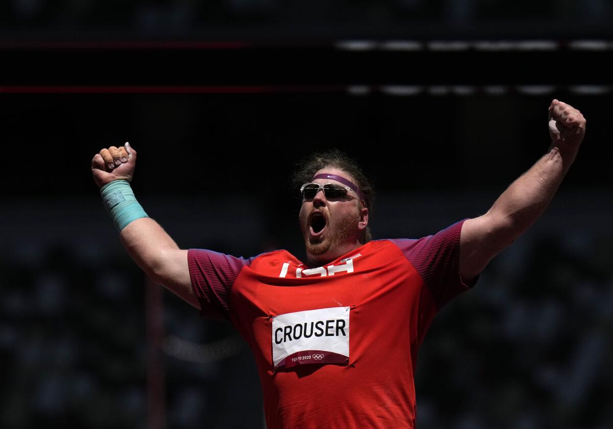 U.S. shot putter Ryan Crouser celebrates after winning gold at the Olympic Games on Thursday.