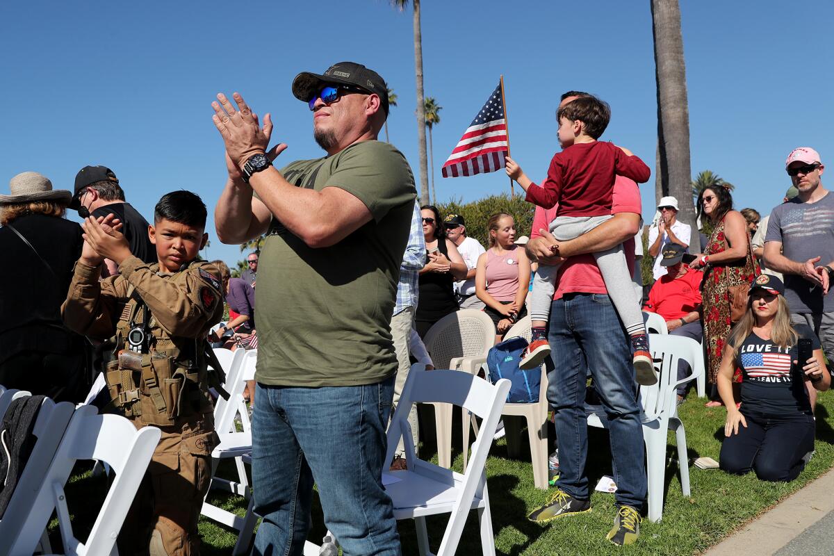 Attendees of a Veterans Day ceremony on Thursday at Monument Point in Laguna Beach.