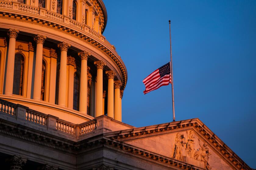 WASHINGTON, DC - JANUARY 11: The sun rises on the U.S. Capitol Building, where heightened security measures are in place nearly a week after a pro-Trump insurrectionist mob breached the security of the nation's capitol while Congress voted to certify the 2020 Election Results on Monday, Jan. 11, 2021 in Washington, DC. (Kent Nishimura / Los Angeles Times)