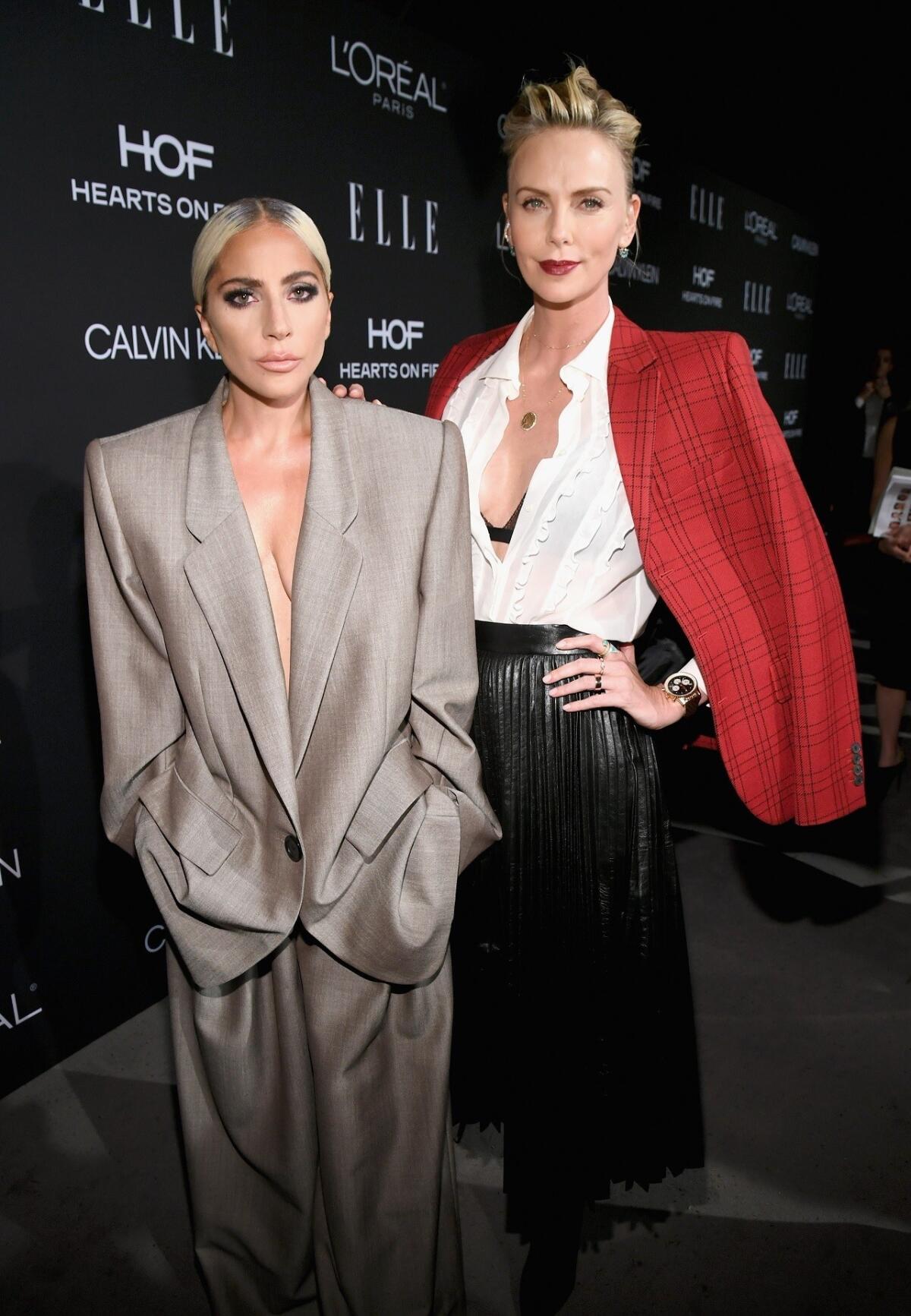 Lady Gaga, left, and Charlize Theron.