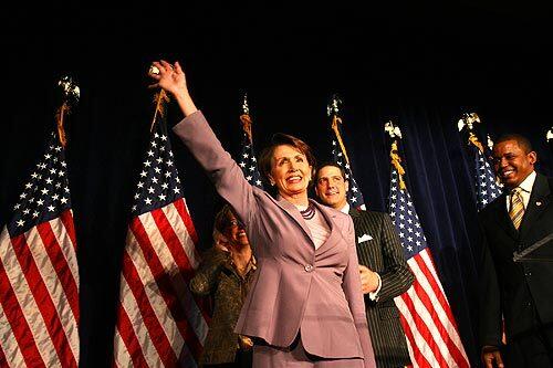 Congresswoman Nancy Pelosi waves to Democratic supporters at the Hyatt on Capitol Hill on election night.