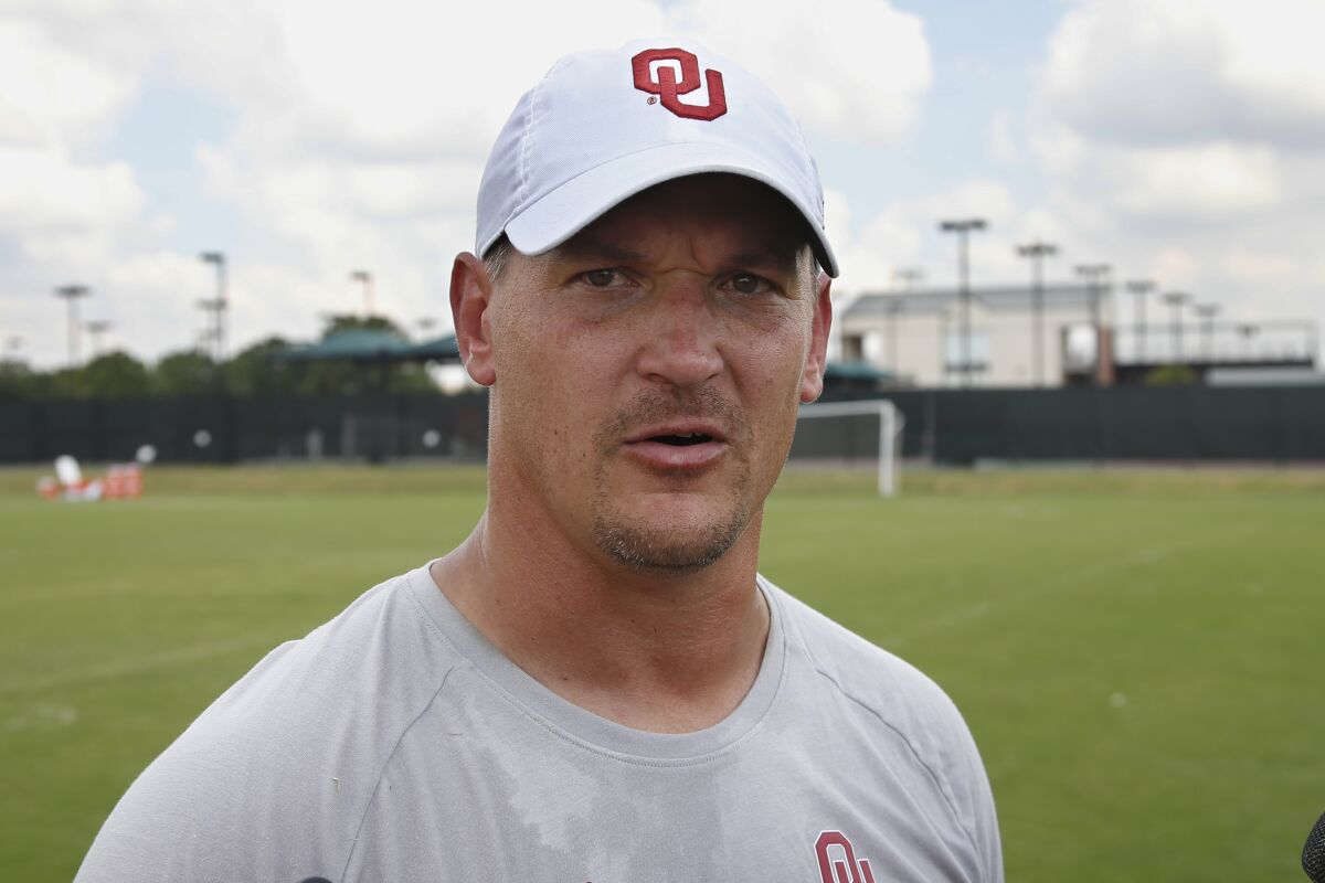 Oklahoma inside linebackers coach Brian Odom speaks with the media in August 2019.