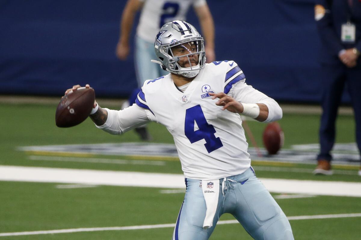 Dallas Cowboys quarterback Dak Prescott throws during a game against the Cleveland Browns.