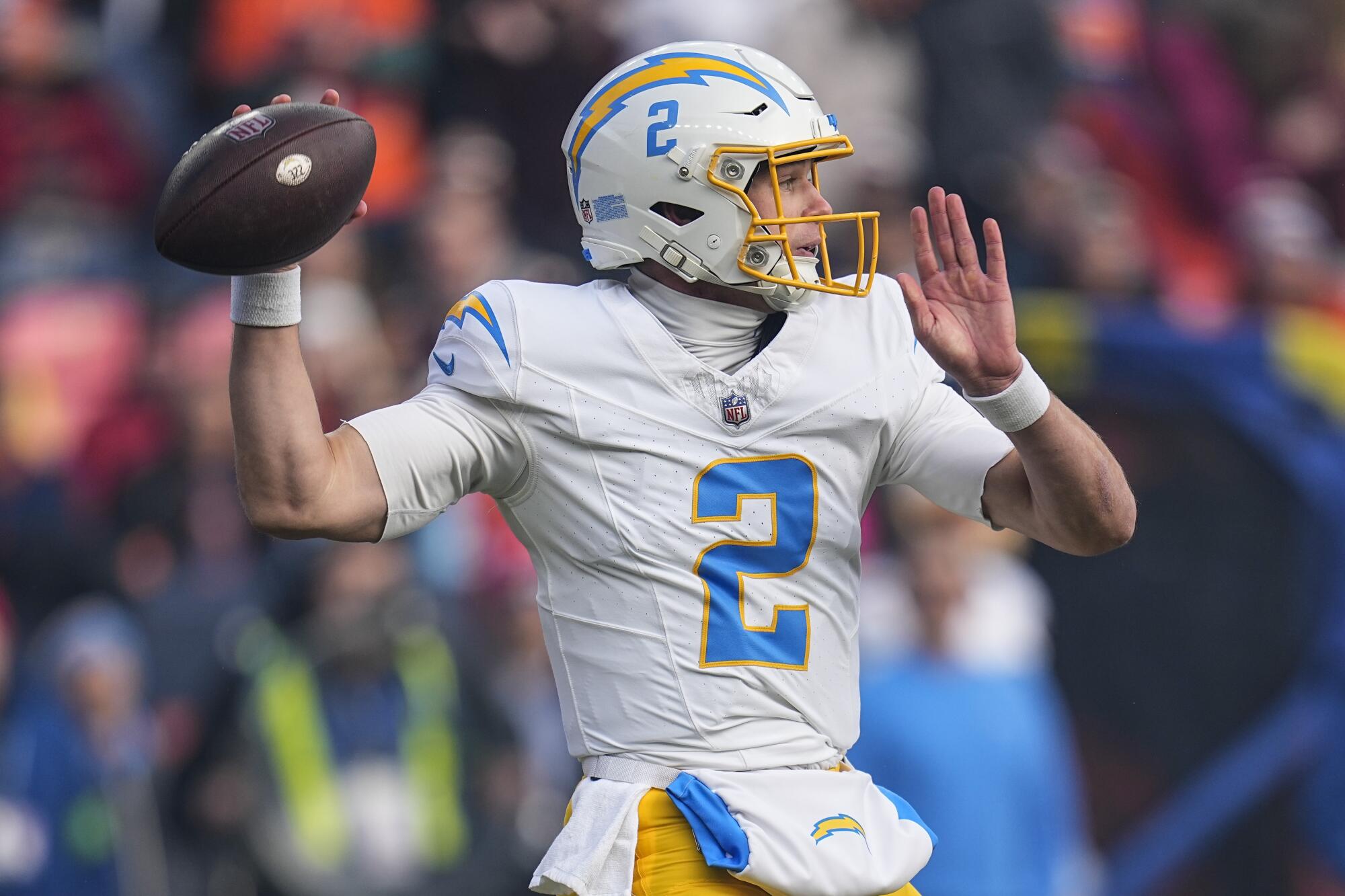 Chargers quarterback Easton Stick passes against the Denver Broncos in the first quarter Sunday.