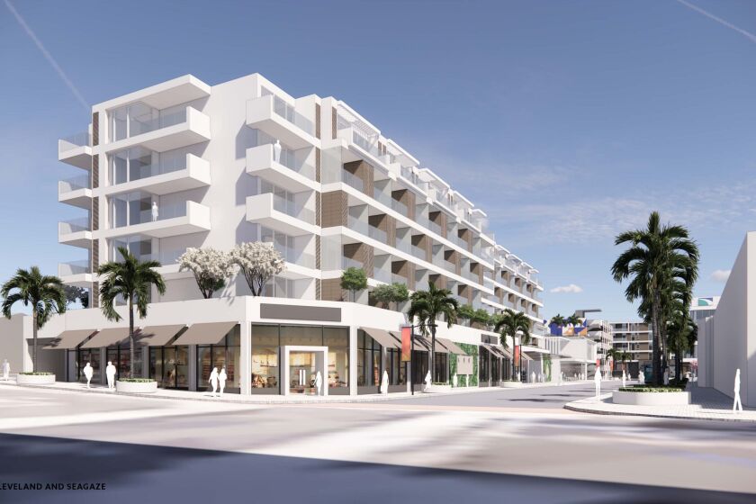 An architectural rendering shows the hotel and retail stores proposed for the Oceanside Transit Center