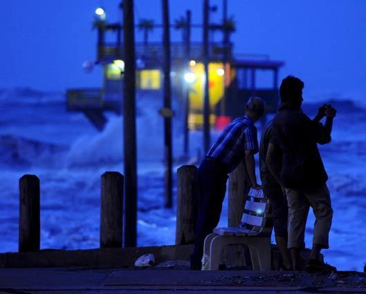 Nightfall brought people to the shore in Galveston to observe the approach of Hurricane Ike, which was expected to hit with full force late tonight.