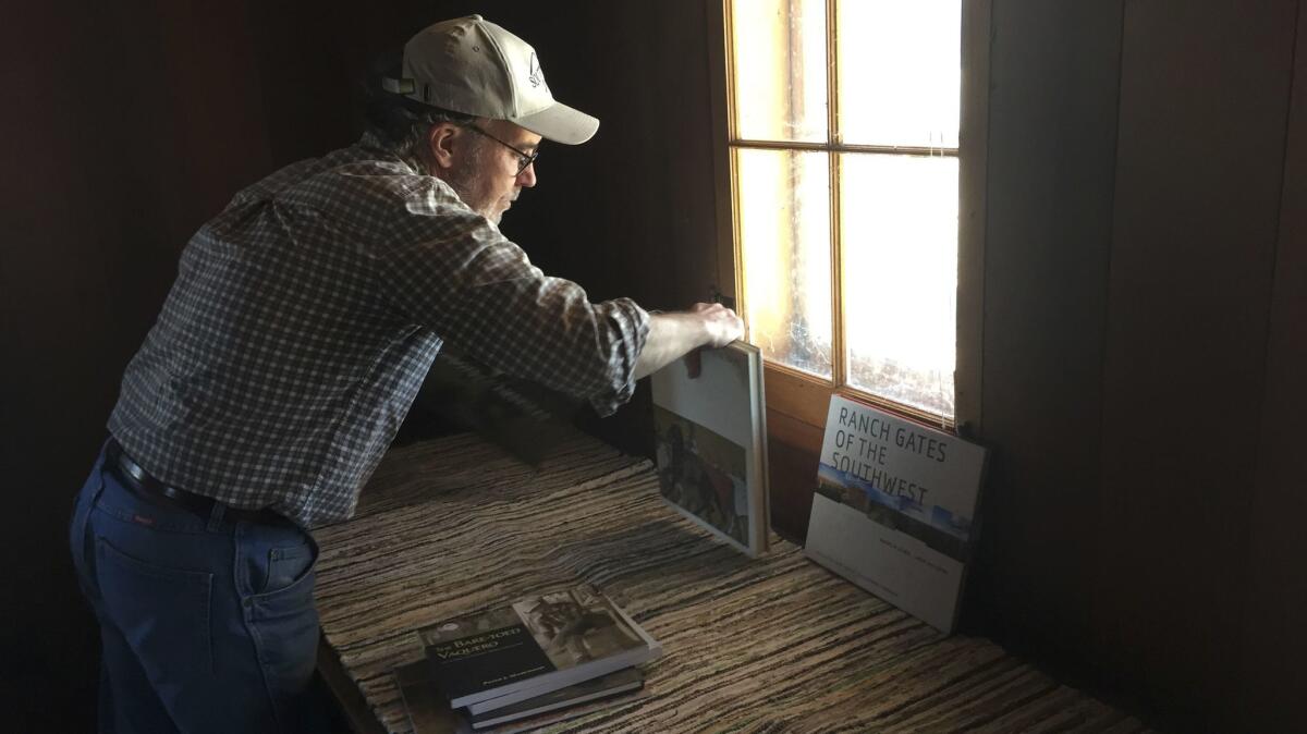 Jeff Lee sets out books in the main house of the Rocky Mountain Land Library. The library sits in South Park, Colo., and will eventually be home to nearly 40,000 books inside a series of rustic buildings on Buffalo Peaks Ranch.