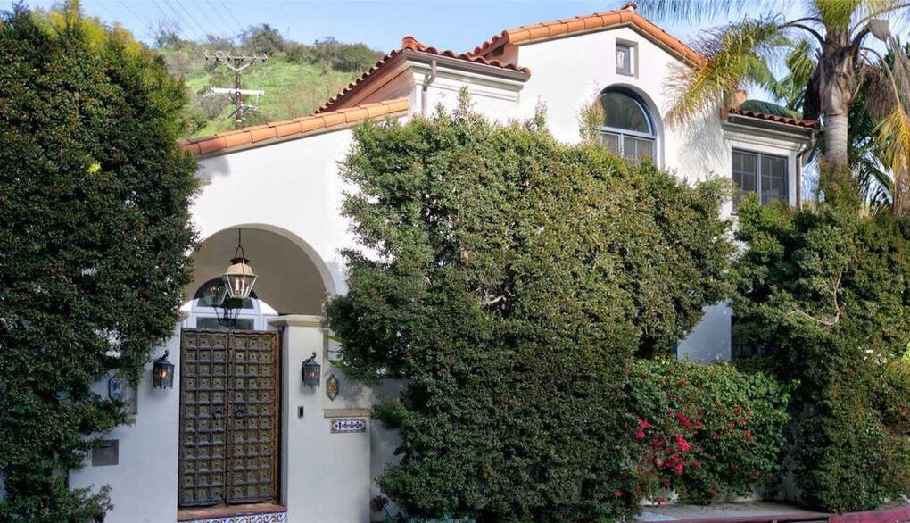 The Mediterranean-style spot includes outdoor spaces such as a courtyard, tiered patio and swimming pool.