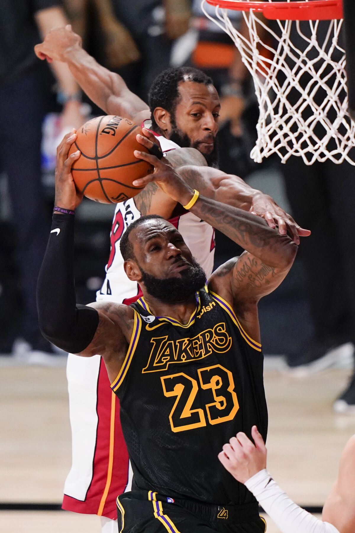 Lakers forward LeBron James drives against the Heat during Game 5.