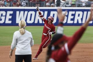Oklahoma's Kasidi Pickering (7) celebrates a home run against Texas during the second inning.