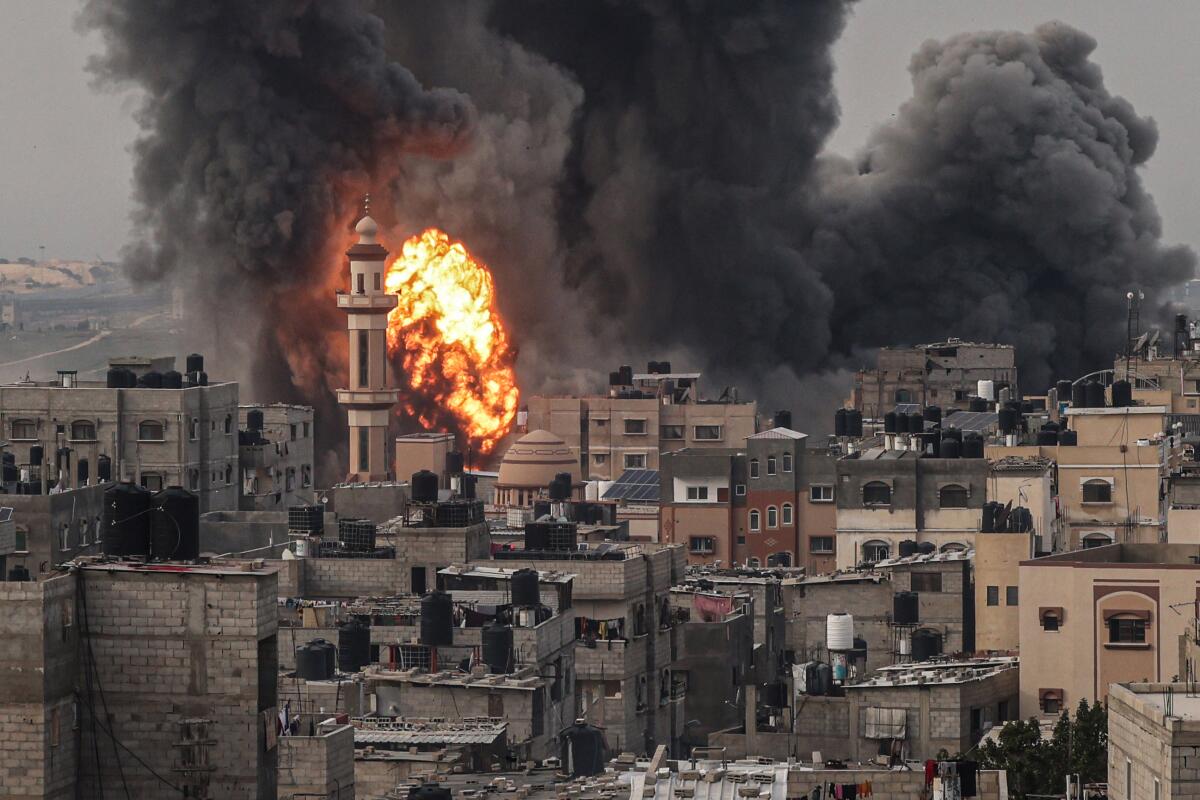 Smoke billows after an Israeli strike over Rafah in the southern Gaza Strip on Dec. 20.