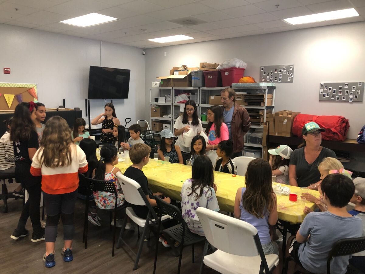 Participants in the slime-making workshop.