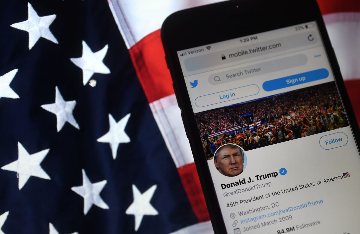 In this photo illustration, the Twitter account of US President Donald Trump is displayed.