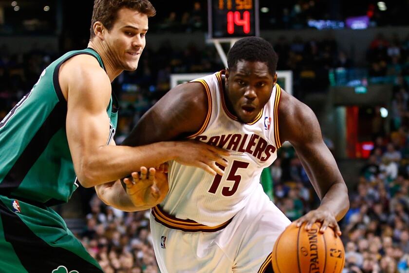 BOSTON, MA - NOVEMBER 29: Anthony Bennett #15 of the Cleveland Cavaliers drives to the basket in front of Kris Humphries #43 of the Boston Celtics in the second half during the game at TD Garden on November 29, 2013 in Boston, Massachusetts. NOTE TO USER: User expressly acknowledges and agrees that, by downloading and or using this photograph, User is consenting to the terms and conditions of the Getty Images License Agreement. (Photo by Jared Wickerham/Getty Images) ** OUTS - ELSENT, FPG, TCN - OUTS * NM, PH, VA if sourced by CT, LA or MoD ** SOURCE Getty Images