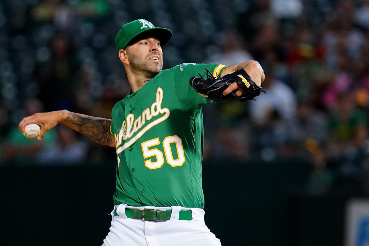 The Athletics' Mike Fiers delivers a pitch against the Rangers on Sept. 20, 2019.