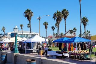 Vendors tents have been popping up in city parks, such as these in Mission Beach Park on Oct. 13, 2021.