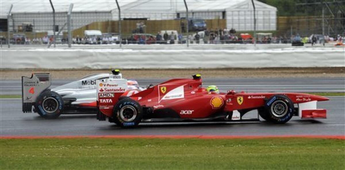 Race winner Fernando Alonso, Bristish GP, Silverstone 2011 de Motorsport  Images en póster, lienzo y mucho más