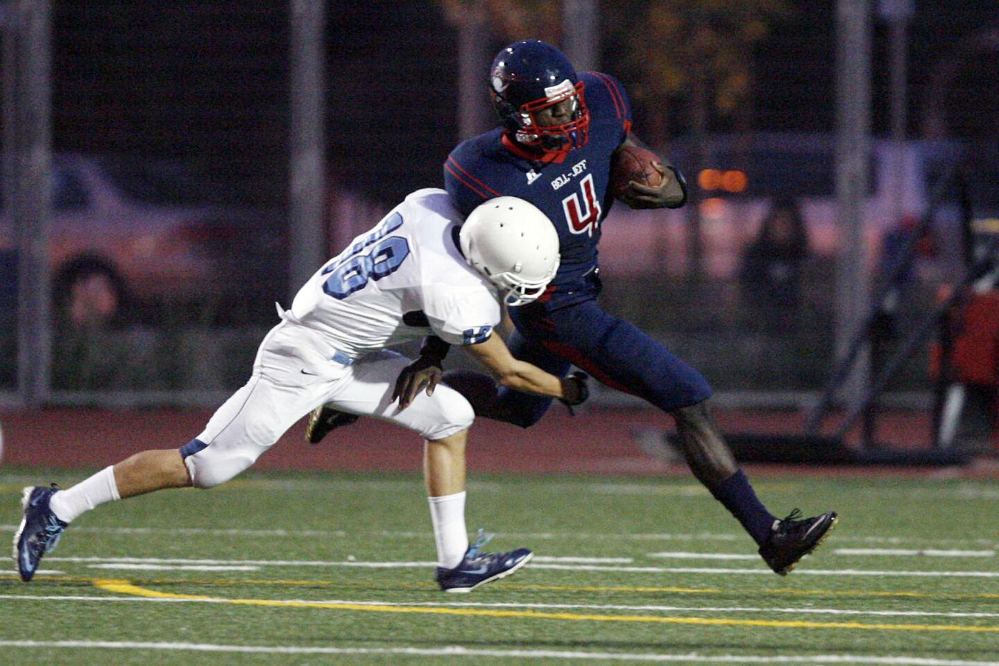 Chadwick's Cameron Bartlett, left, tackles Bell-Jeff's Jalen Henry during a game at John Burroughs High School in Burbank on Saturday, September 22, 2012.
