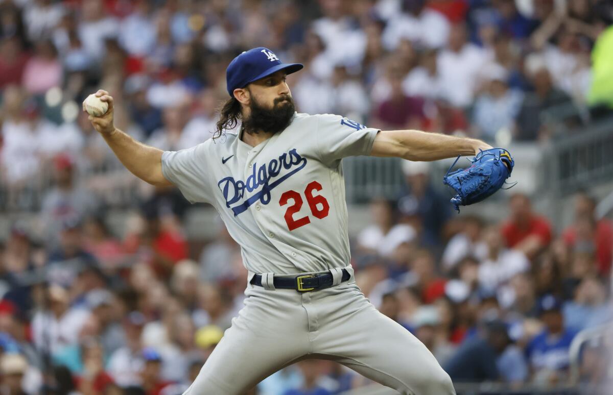 Los Angeles Dodgers starting pitcher Tony Gonsolin throws to an Atlanta Braves batter during the first inning of a baseball game Sunday, June 26, 2022, in Atlanta. (AP Photo/Bob Andres)