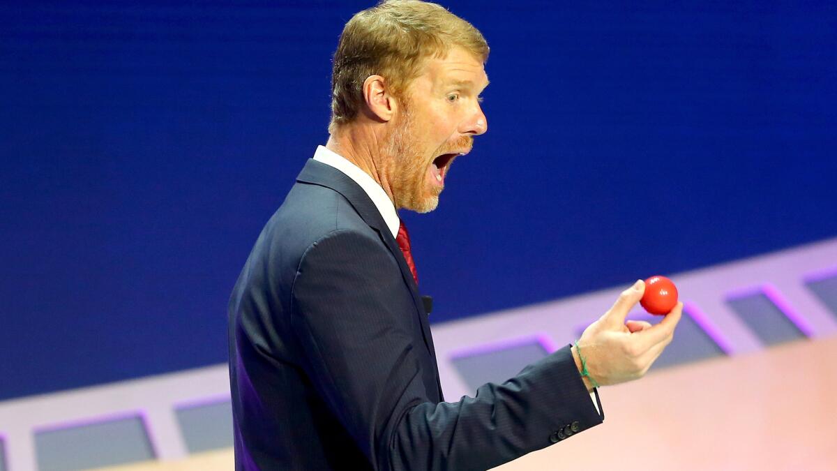Alexi Lalas reacts after drawing the first ball of the night during the 2016 Copa America draw in New York on Sunday.