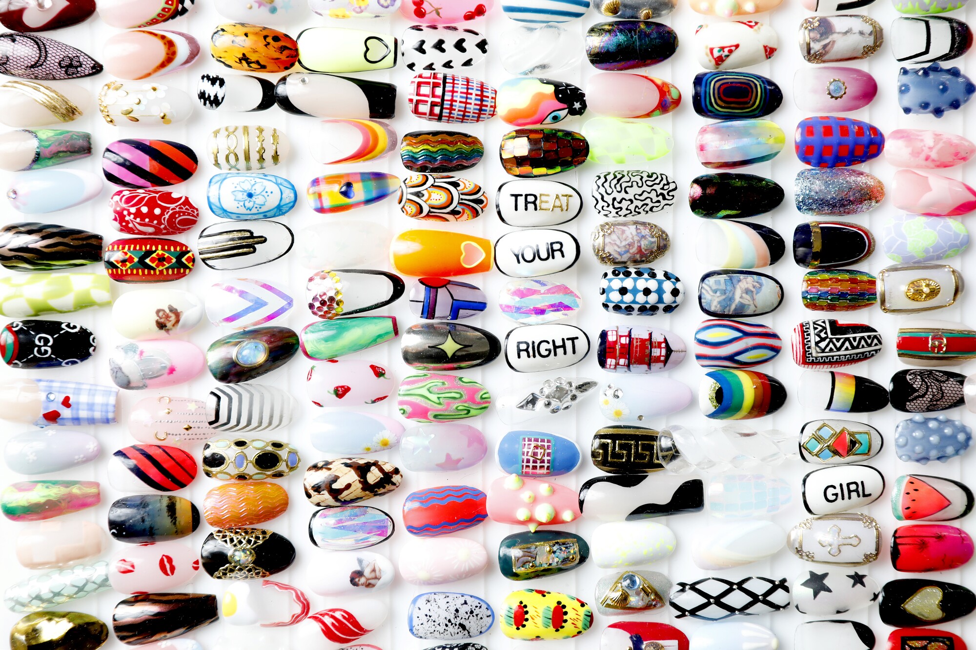 Nail designs in a manicurist's studio.