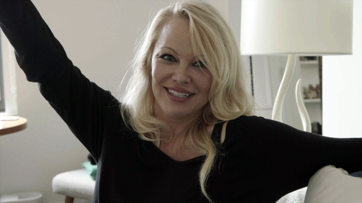 This image released by Netflix shows Pamela Anderson in a scene from the documentary "Pamela, A Love Story." (Netflix via AP)