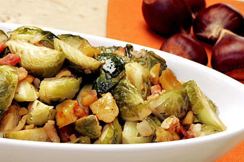 FLAVORFUL SIDE: Brussels sprouts braised with bacon and chestnuts are a robust addition to an autumn meal.