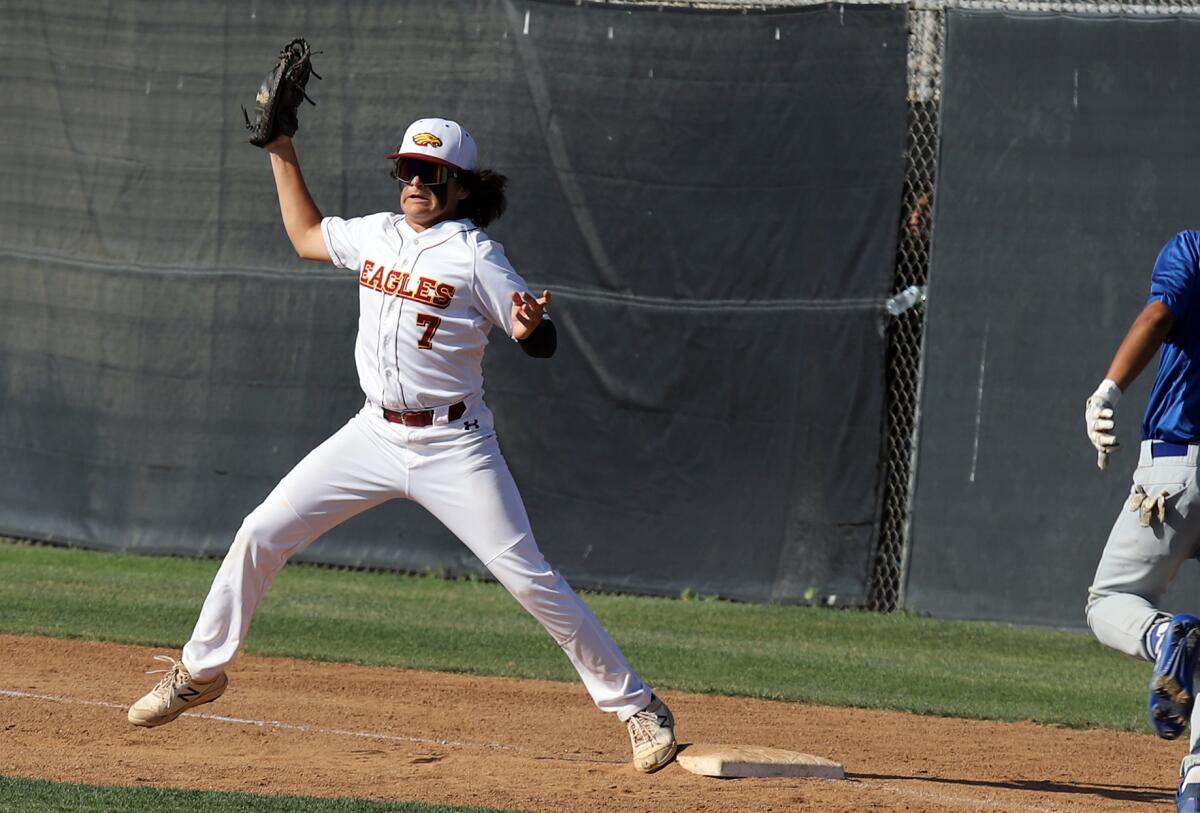 Estancia's Miles Moyer (7) gets the out at first during the CIF State Southern California Regional Division V final.