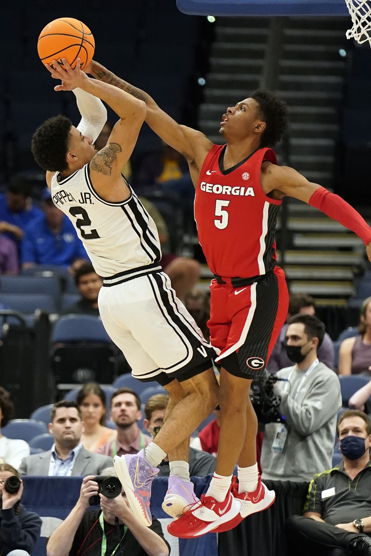 Vanderbilt guard Scotty Pippen Jr. (2) shoots over Georgia guard Christian Wright (5) during the second half of an NCAA college basketball game in the Southeastern Conference men's tournament Wednesday, March 9, 2022, in Tampa, Fla. (AP Photo/Chris O'Meara)