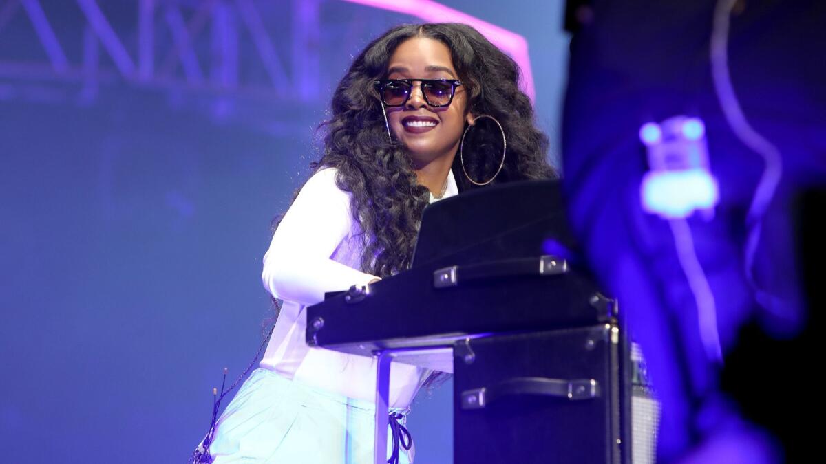 H.E.R. performs during opening night of the BET Experience at Staples Center. She was one of a handful of headliners that also performed on the network's awards show on Sunday.