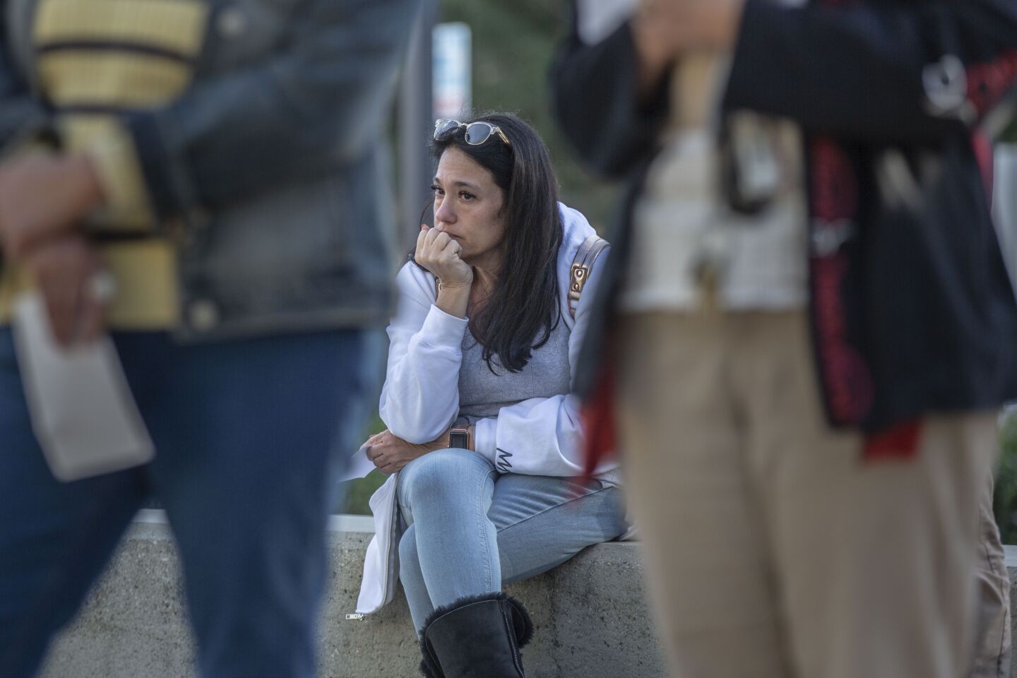 Melissa Levy listens during the memorial service at Cal State San Bernardino.
