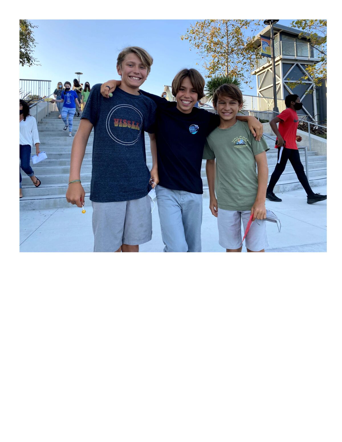 Friends reconnect on the first day of school at Earl Warren.