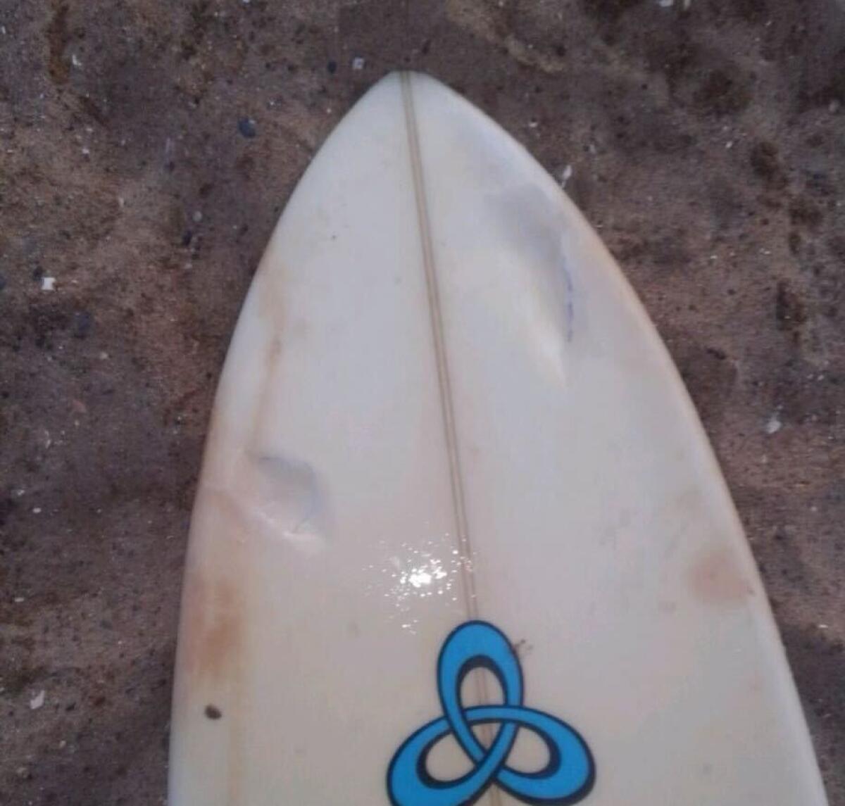 A damaged surfboard