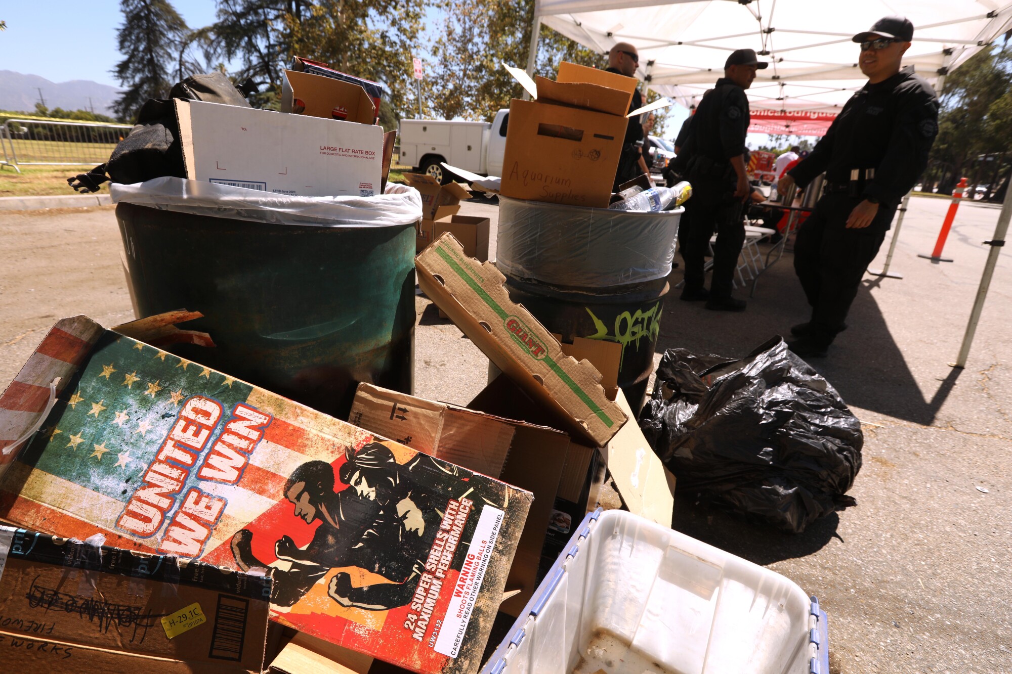 Empty boxes that were once used to store fireworks. LAPD removed fireworks from these boxes. 
