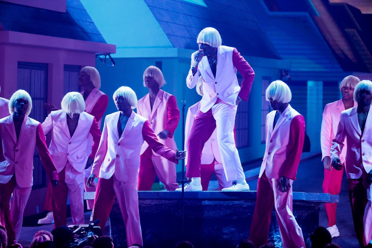 Tyler, The Creator performs at the 62nd Grammy Awards. He won the prize for best rap album during Sunday night's ceremony.