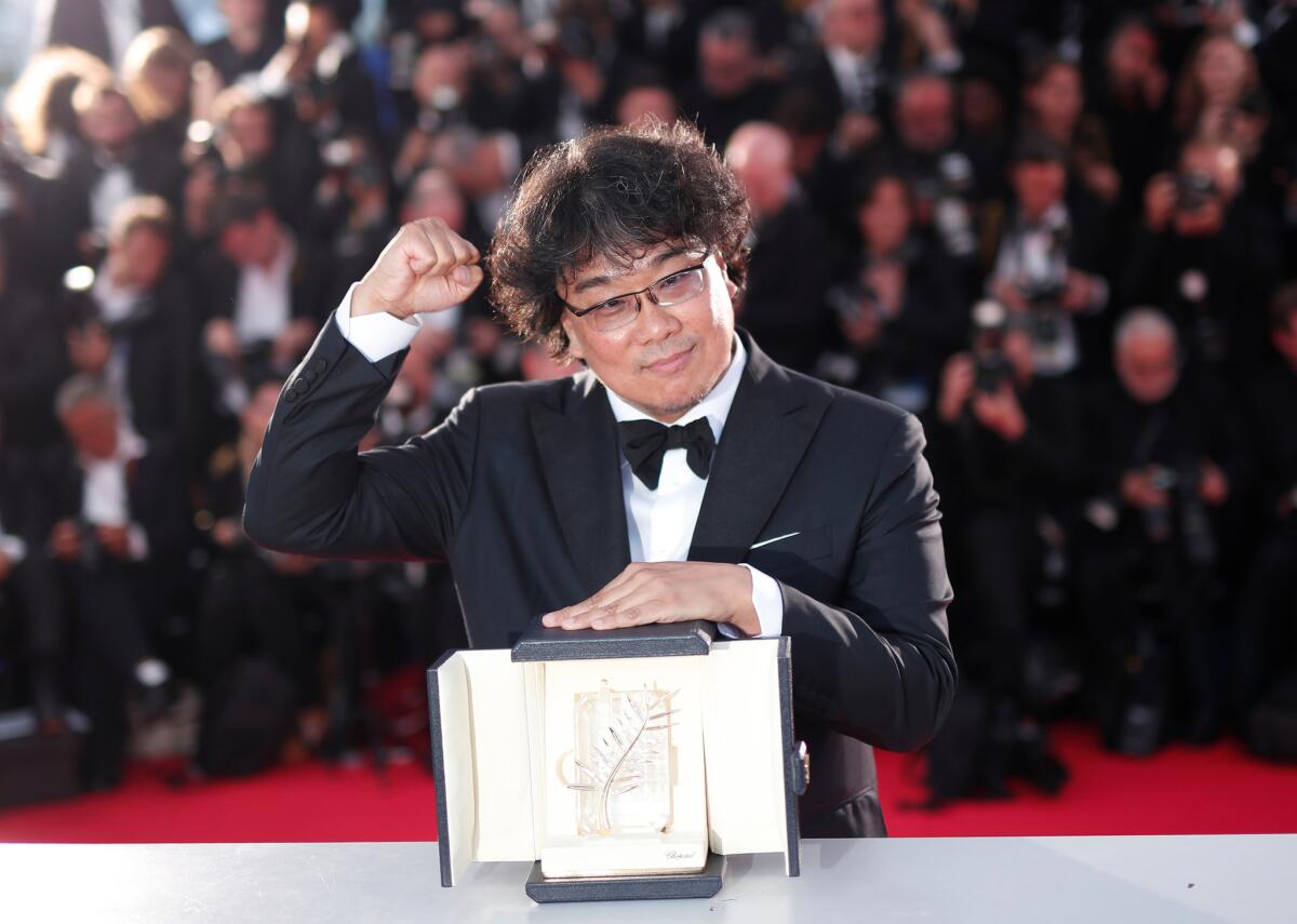Bong Joon Ho with his Palme d'Or for "Parasite" at the 72nd Cannes Film Festival.
