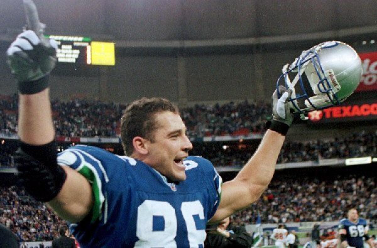 Christian Fauria celebrates a Seahawks victory over Kansas City.